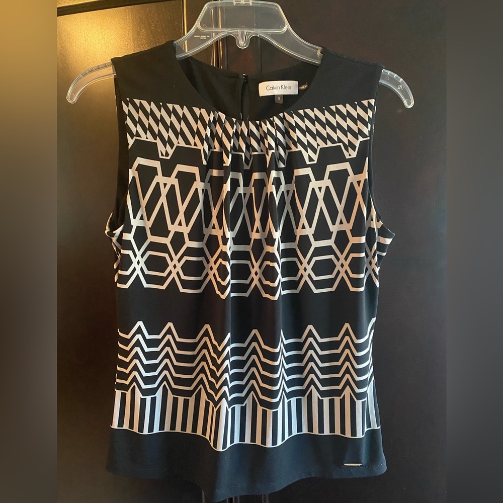 Calvin Klein sleeveless black blouse in tan and black